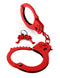 Designer red metal handcuffs by Pipedream with keys, durable bondage gear for playful restraint and thrill exploration.