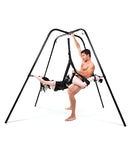 Couple using the Fetish Fantasy Series Swing Stand for adventurous bondage play.
