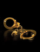 Fetish Fantasy Gold Metal Cuffs Gold with keys on a black background, perfect for stylish bondage play.
