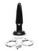 Fetish Fantasy Series Limited Edition Ultimate Bondage Kit including a black plug and metal handcuffs.