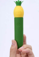 Maia Pina Rechargeable Mini Vibe held in hand, featuring playful pineapple design and compact green body.