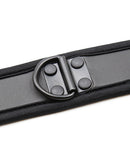 Close-up of the D-ring on the Plesur Neoprene Puppy Collar Black, showcasing its secure attachment and sleek design.