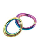Plesur 1-3/4 Inch Metal Cock Ring Rainbow showing two rainbow-toned stainless steel cock rings.