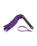 Plesur Mini Leather Flogger Purple with soft suede leather tassels and a comfortable handle, ideal for playful impact play.