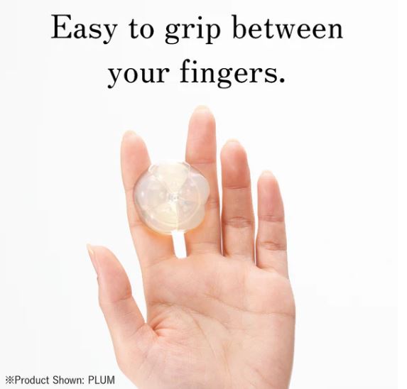 Hand holding Tenga Iroha Petit Plum, showcasing its easy grip for intimate pleasure.