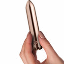 Golden Rose Rechargeable Bullet Rose Gold held in hand showcasing its sleek design and rose gold finish.