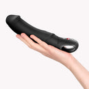 Fun Factory Big Boss G-Spot Vibrator Black held in hand, showcasing its ergonomic design and controls.