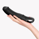 Fun Factory Big Boss G-Spot Vibrator Black held in a hand, showcasing its sleek design and control buttons.
