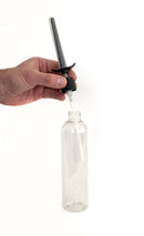 Boneyard Skwert Lube Injector 4 Piece Set being used with a lube bottle for precise application.