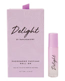 Delight by Raw Chemistry Pheromone Perfume Roll On 10 ml with elegant packaging and applicator.