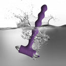 Petite Sensations Pearls Purple silicone vibrating anal beads in water, showcasing its design and functionality.