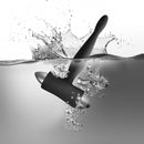 Rocks Off Teazer 7 Speed Black Bullet Vibrator submerged in water, highlighting its sleek design and powerful features.