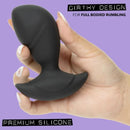 Rock Bottom Rumbling Stud Anal Probe Black shown in hand, featuring a girthy design and made of premium silicone for targeted stimulation.