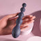 Hand holding Zero Tolerance Rumpy Bumpy beaded vibrator with 10 speeds and waterproof design for maximum pleasure.