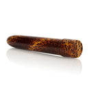 The Leopard Massager 6.5 inches Vibrator on a reflective surface with a bold leopard-print design.