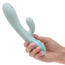 Aura Dual Ripple Rabbit Vibrator held in hand featuring soft silicone and rippled design for stimulation.