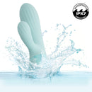 Aura Dual Ripple Rabbit Vibrator splashing in water, showcasing its waterproof design and sensual features.