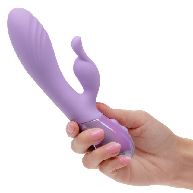 Aura Dual Bunny Rabbit Vibrator held in hand, showcasing its sleek design and playful functionality.