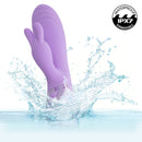 Aura Dual Bunny Rabbit Vibrator splashing in water, showcasing its waterproof and submersible design.
