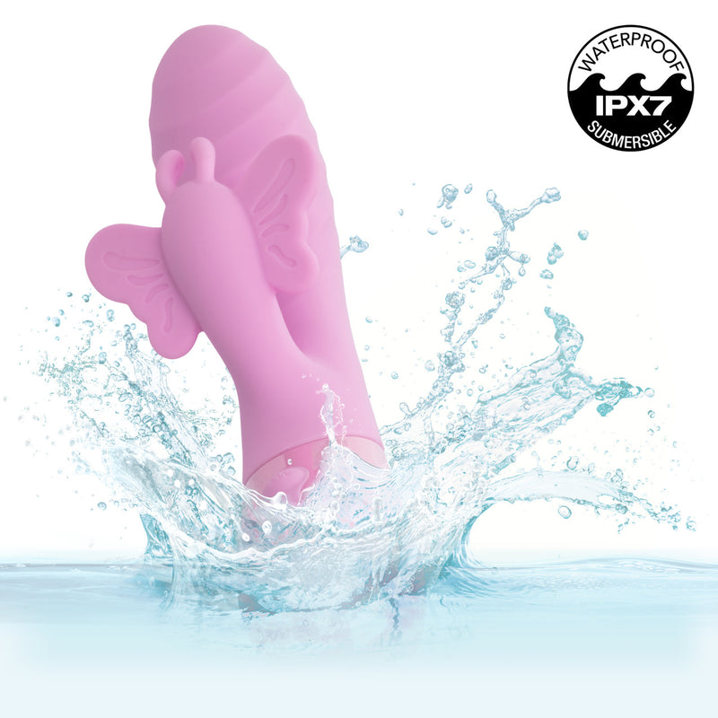 Aura Dual Flutter Rabbit Vibrator in water showcasing its dual stimulation features and waterproof design.