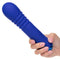 Hand holding the Thicc Chubby Thrusting Wand, a blue dual motor massager with a 5.75-inch circumference shaft, designed for intense pleasure.