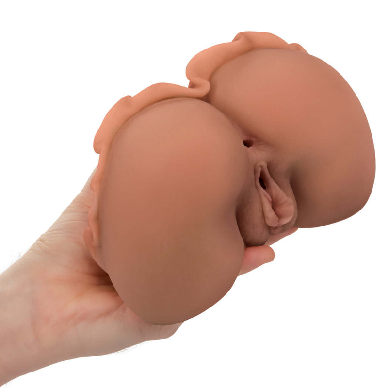 Cheap Thrills The Homecoming Queen dual entry masturbator with ultra life-like Pure Skin material held in hand for sensual exploration