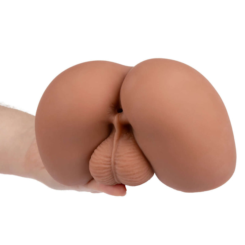 Hand holding Cheap Thrills The Mechanic male masturbator with lifelike design and realistic features.