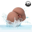 Stroke It Vibrating Twerking BBL Brown Realistic Masturbator submerged in water, showcasing its waterproof feature.