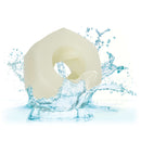 Textured glow-in-the-dark stroker submerged in water with splashes around, highlighting its aquatic adaptability.