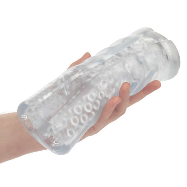 Hand holding Cyclone Dual Chamber Stroker XL, showcasing its dual-ribbed design for intense stimulation and solo pleasure.