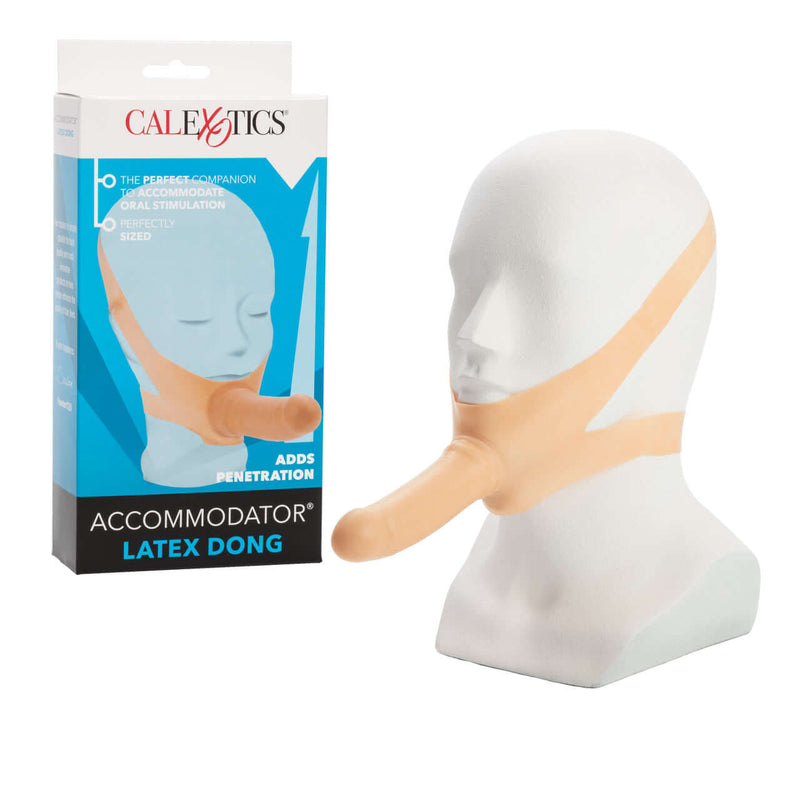 Accommodator Silicone Dong with packaging, hands-free oral stimulator for couples, beige dong on mannequin head.