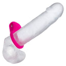 Basic Essentials Vibrating Ridge Rider Silicone Cock Ring Pink with clear body and textured enhancement for shared pleasure.
