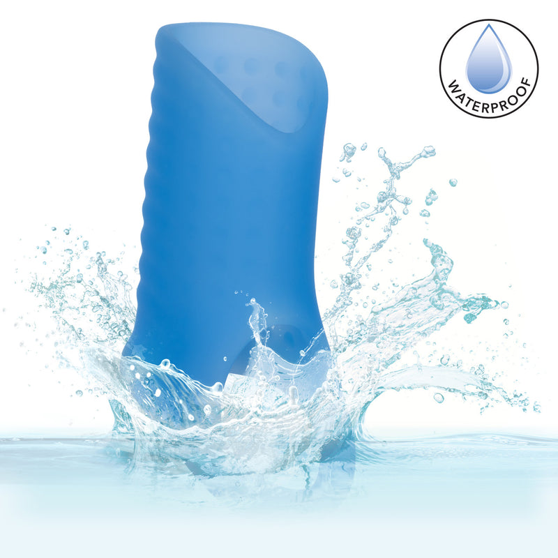 Basic Essentials Liquid Silicone Pleasure Enhancer Blue splashing in water, highlighting its waterproof feature.