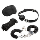 Pleasure Kits Explorer Collection Black bondage kit including a ball gag, cuffs, rope, and blindfold.