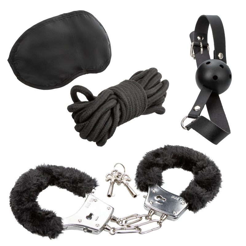Pleasure Kits Explorer Collection Black bondage kit including handcuffs, blindfold, rope, and gag.
