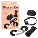 Pleasure Kits Explorer Collection Black bondage kit with restraints, gag, mask, and rope for sensory play.
