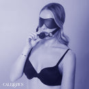 Nocturnal Collection Eye Mask and Breathable Ball Gag worn by model, enhancing bondage play with sensory depth.