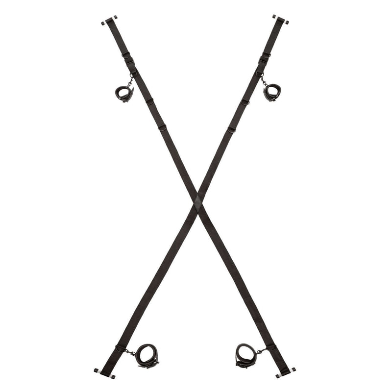 Adjustable door cross restraint system for intimate play from Nocturnal Collection, featuring secure straps and cuffs.