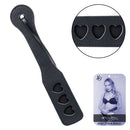 Nocturnal Collection Heart Throb Paddle featuring heart-shaped cutouts for playful BDSM sessions.