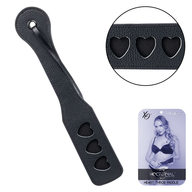 Nocturnal Collection Heart Throb Paddle featuring heart-shaped cutouts for playful BDSM sessions.