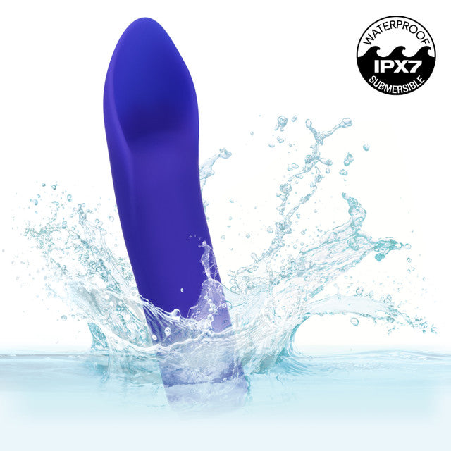 Raven Flutter Vibrator splashing in water, showcasing its waterproof design and sleek purple silicone.