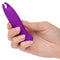 Compact purple Kyst Teaser Flickering Bullet Vibrator held in hand, showcasing its small and travel-friendly design.