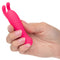 Person holding Kyst Bunny 10 Function Rechargeable Bullet Vibrator with bunny ears in vibrant pink color.