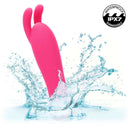 Kyst Bunny 10 Function Rechargeable Bunny Ears Bullet Vibrator splashing in water, showcasing its waterproof IPX7 submersible feature