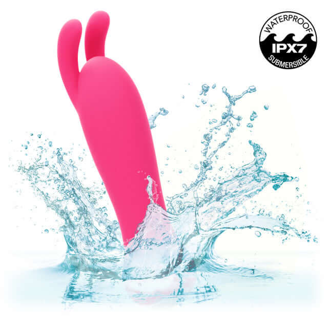 Kyst Bunny 10 Function Rechargeable Bunny Ears Bullet Vibrator splashing in water, showcasing its waterproof IPX7 submersible feature
