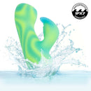 Endless Summer Twilight Tease Dual Vibe Light-up Massager splashing in water, showcasing its waterproof design.