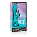 California Dreaming Santa Monica Starlet Blue Rabbit Vibrator in stylish packaging with vibrant seaside background.