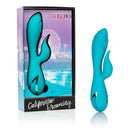 California Dreaming Santa Monica Starlet Blue Rabbit Vibrator elegantly displayed in its packaging with a beach background.