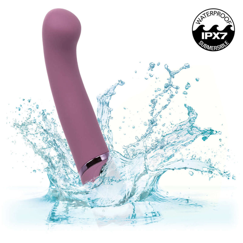Orgasmatron Digital G-Wand Massager with ergonomic angle and waterproof IPX7 rating splashing in water