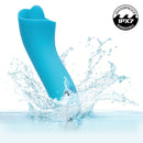 Kroma Turbo Exciter Rechargeable Mini Massager Blue splashing in water, showcasing its waterproof design.
